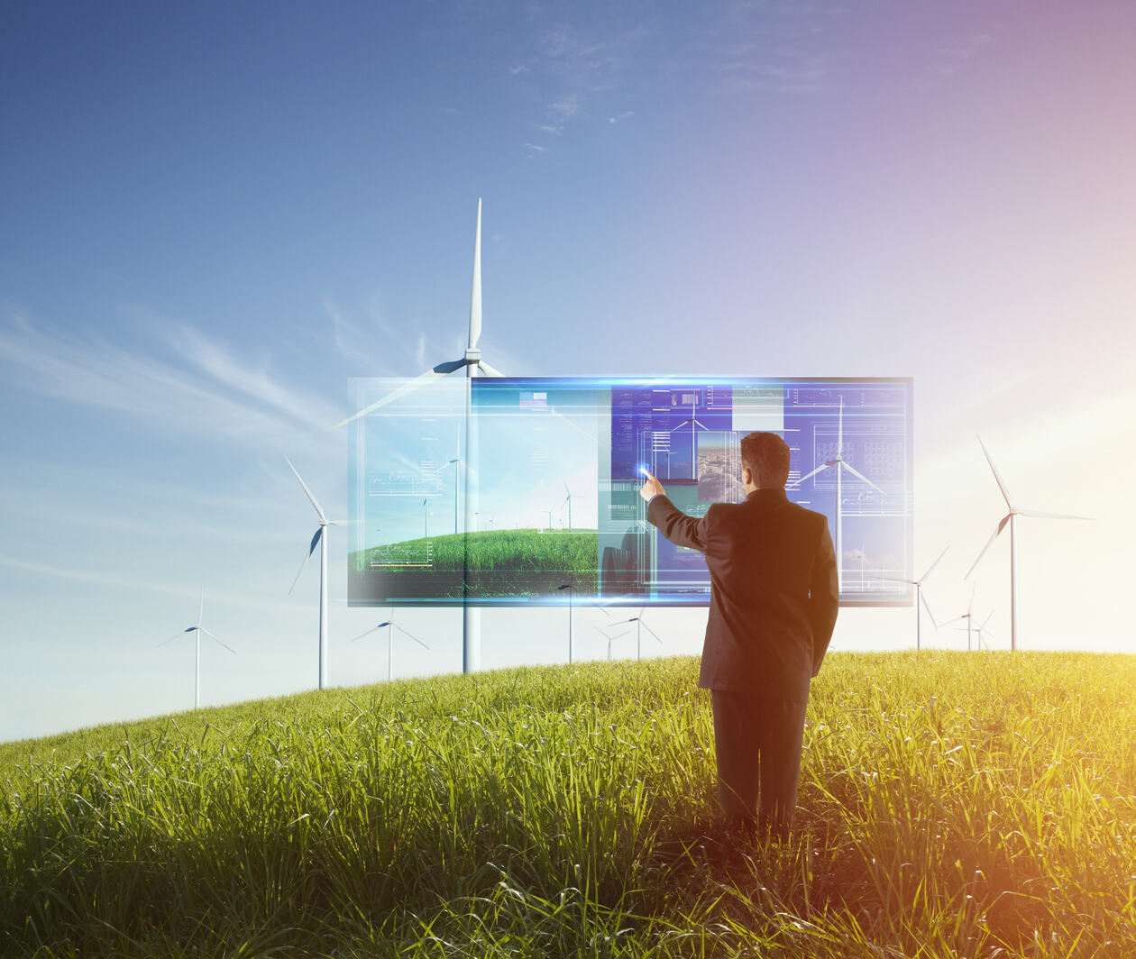 an illustration of a person in a suit on a hill looking out over a smart power plant