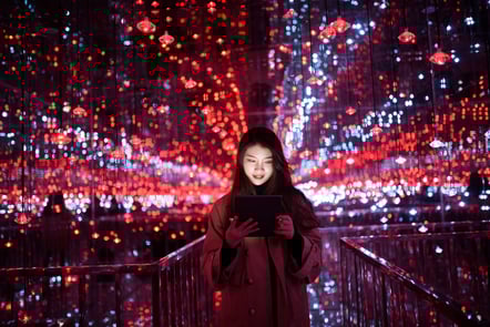Young Asian female using digital tablet