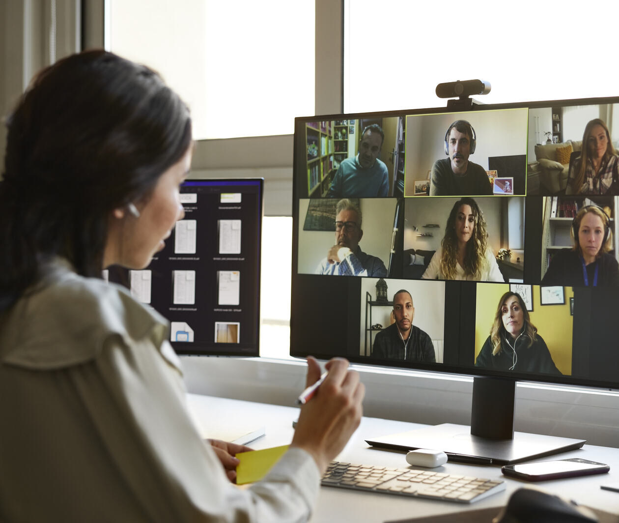 Diverse team using digital technology for a video call