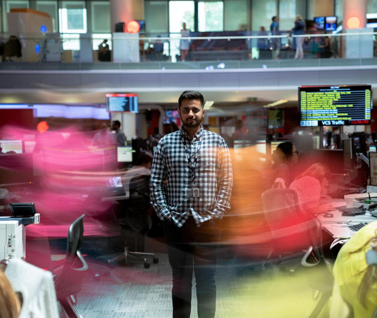 a man standing in an office