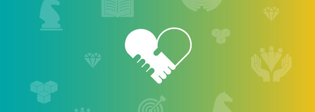 An icon of a heart that is made up of two hands interlocked