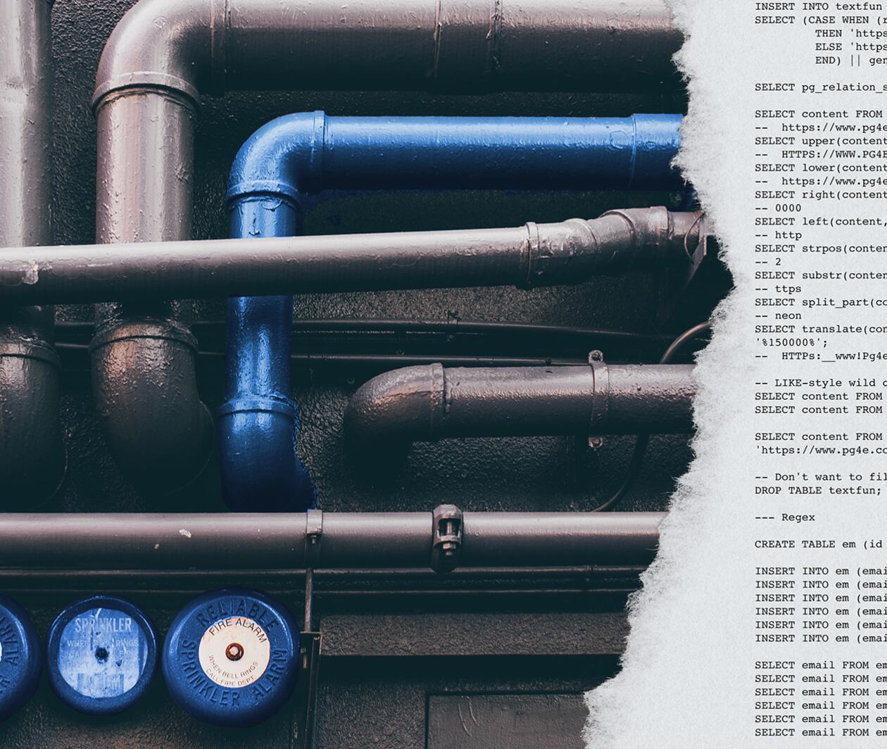 Blue and black coloured pipes across a wall. On the right side of the image is an excerpt of SQL typed on white paper. 