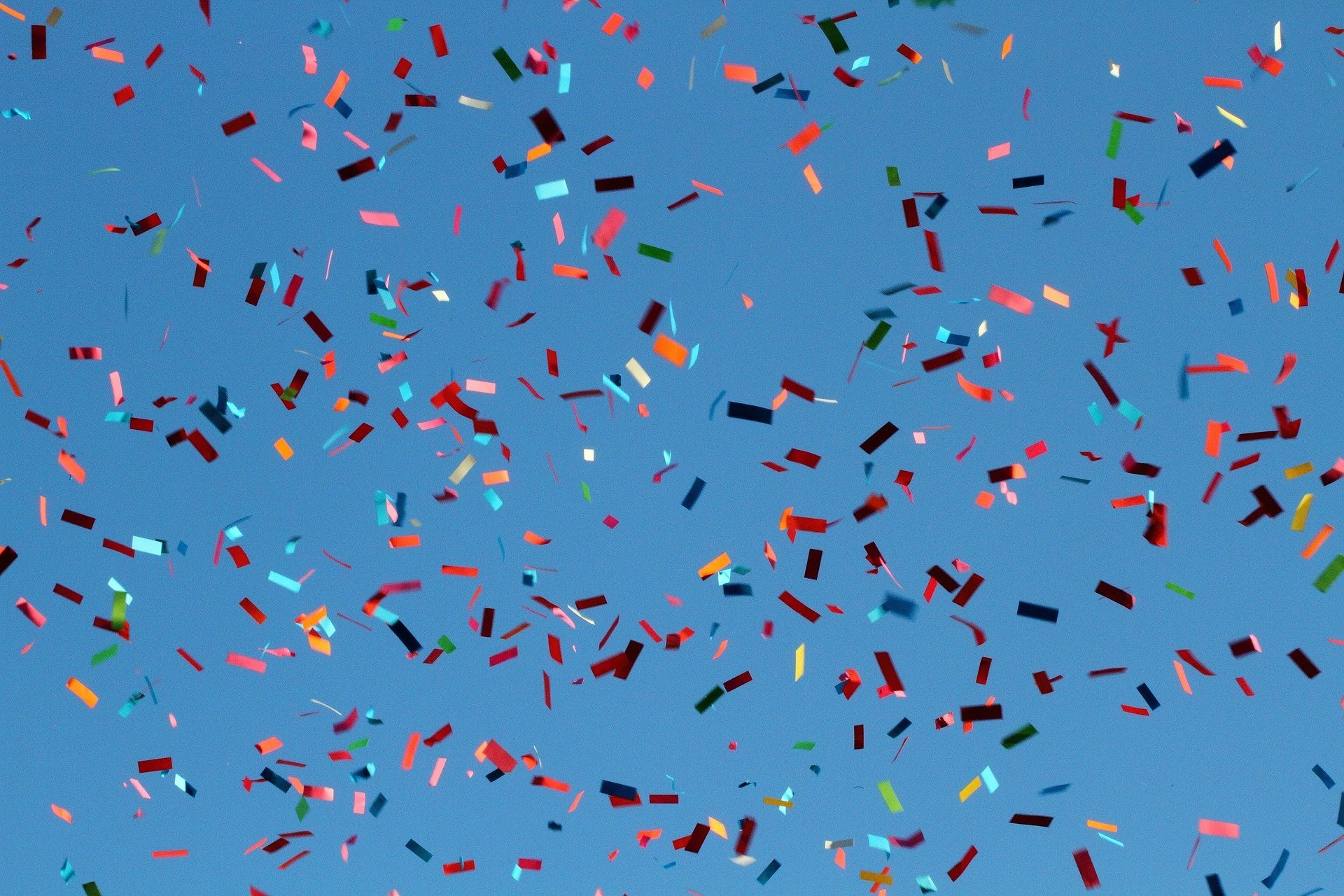 Multi-coloured confetti in the air