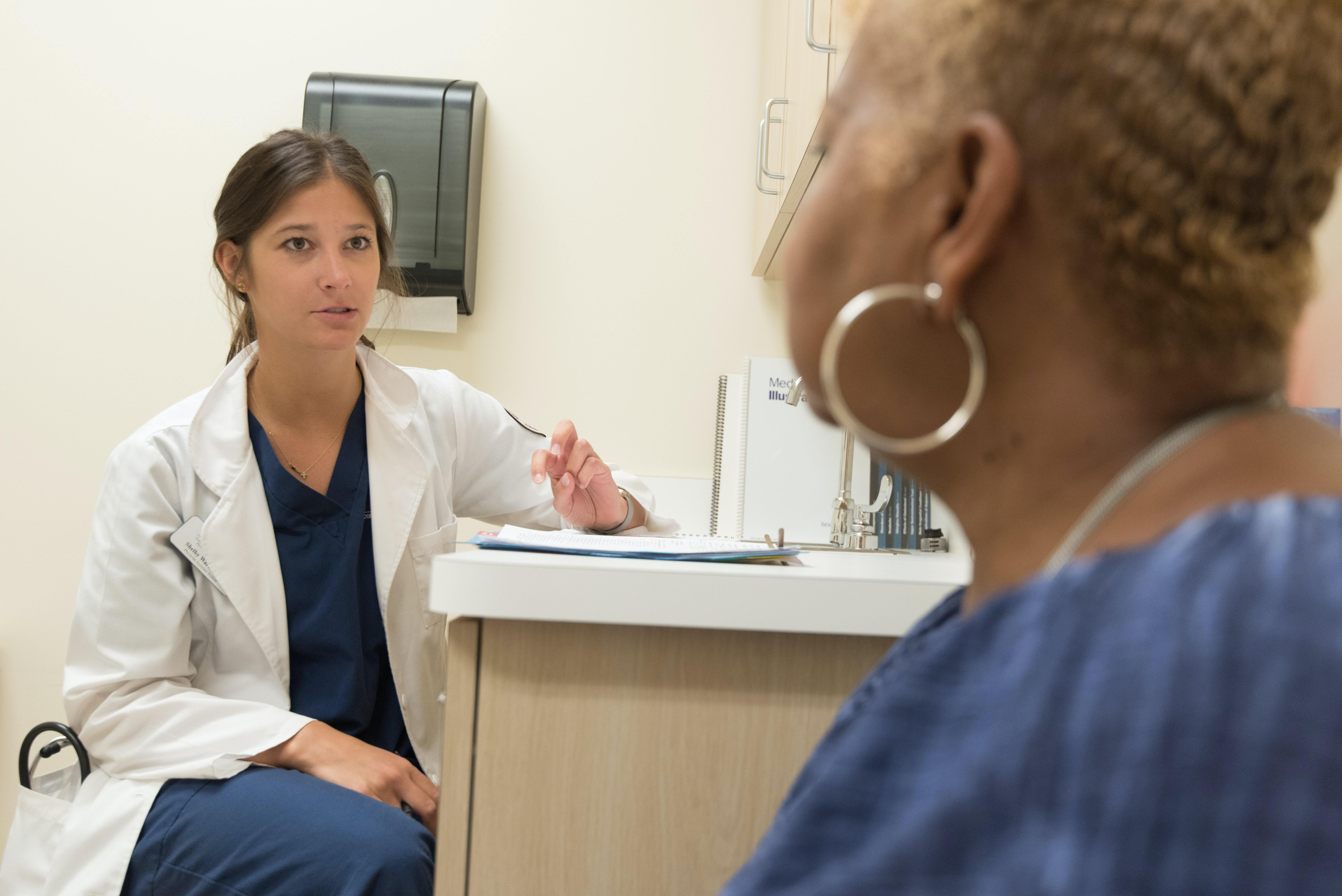 Doctor and patient communicating