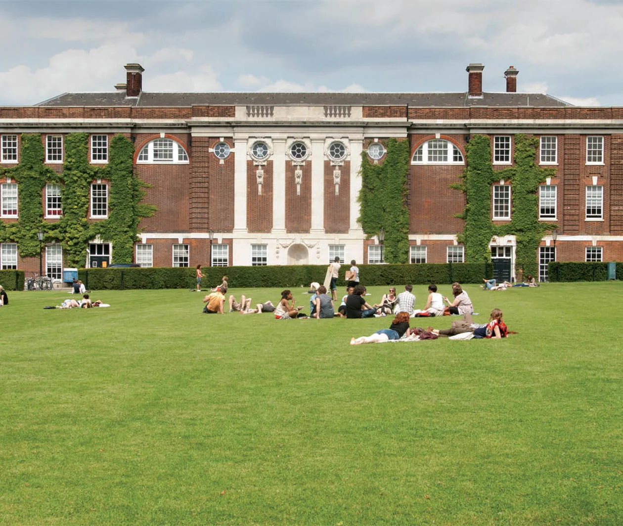 Students relaxing on the university green