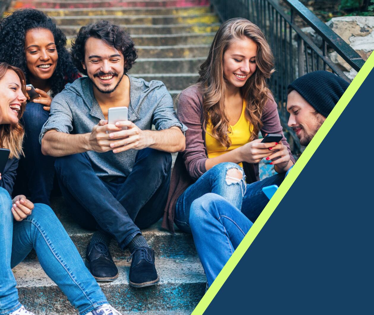 A group of happy people showing each other their phones