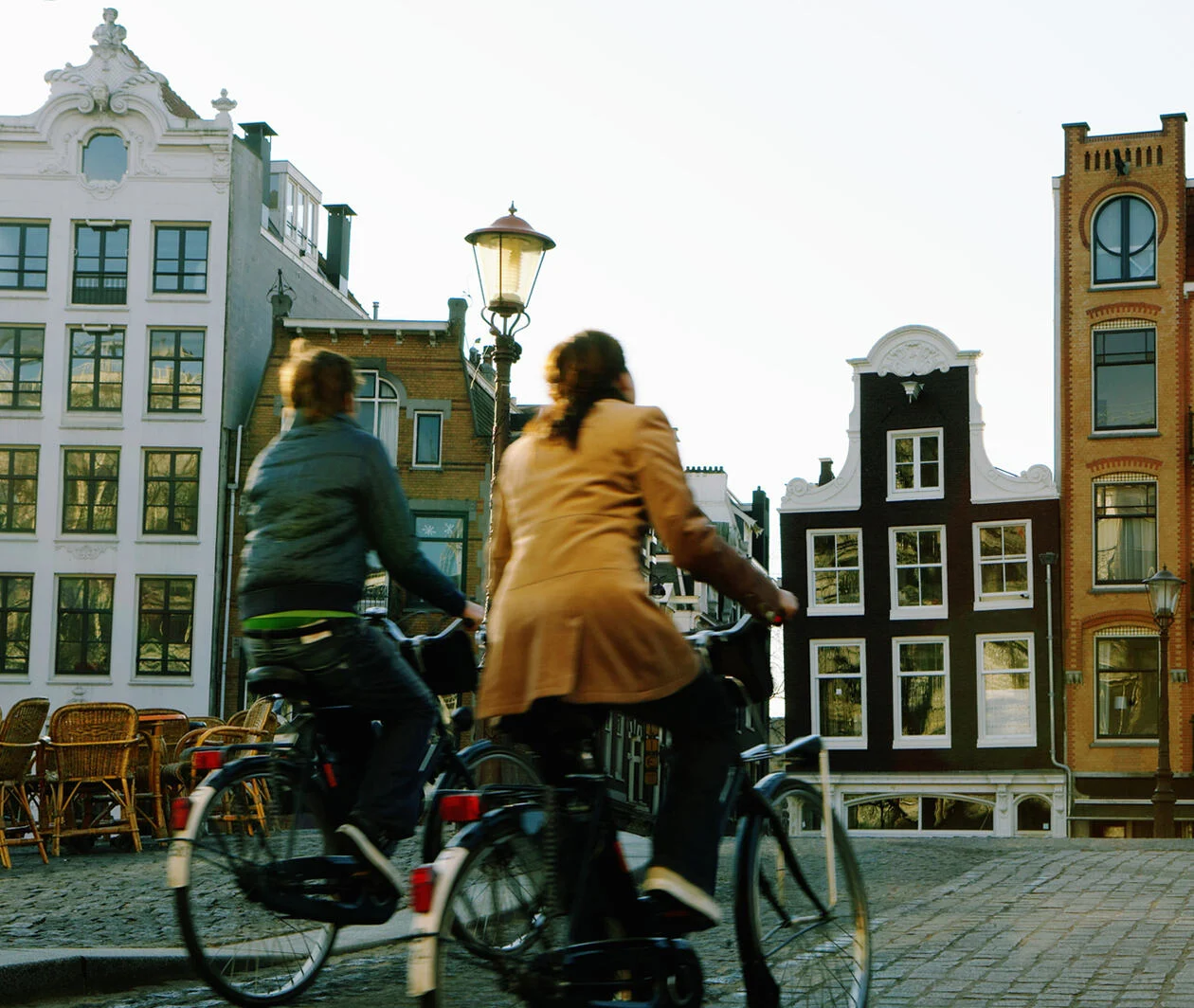 Tourists cycling