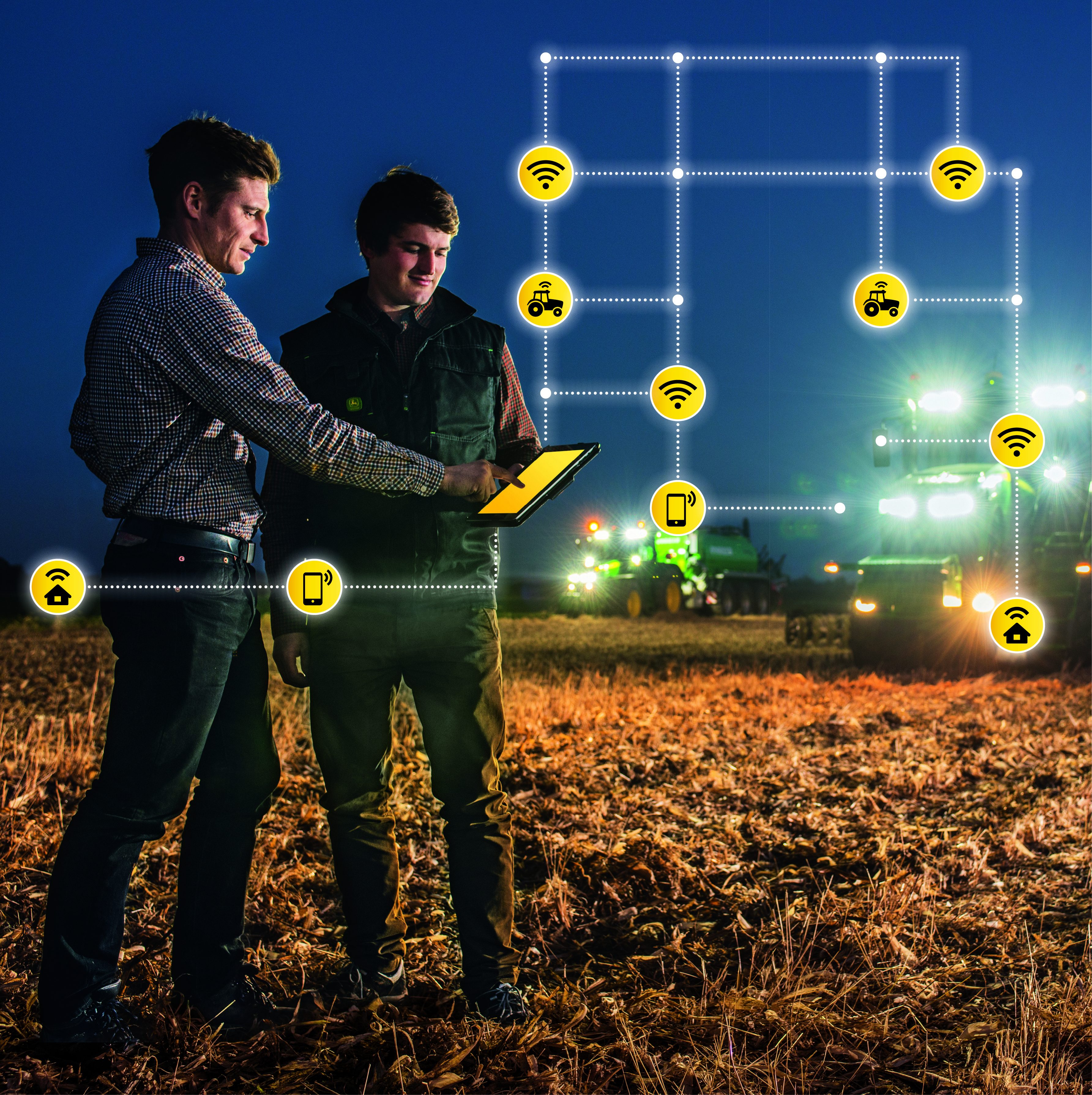 two men standing in a field  with farm machinery in the background, looking at a tablet with a map of digital data superimposed