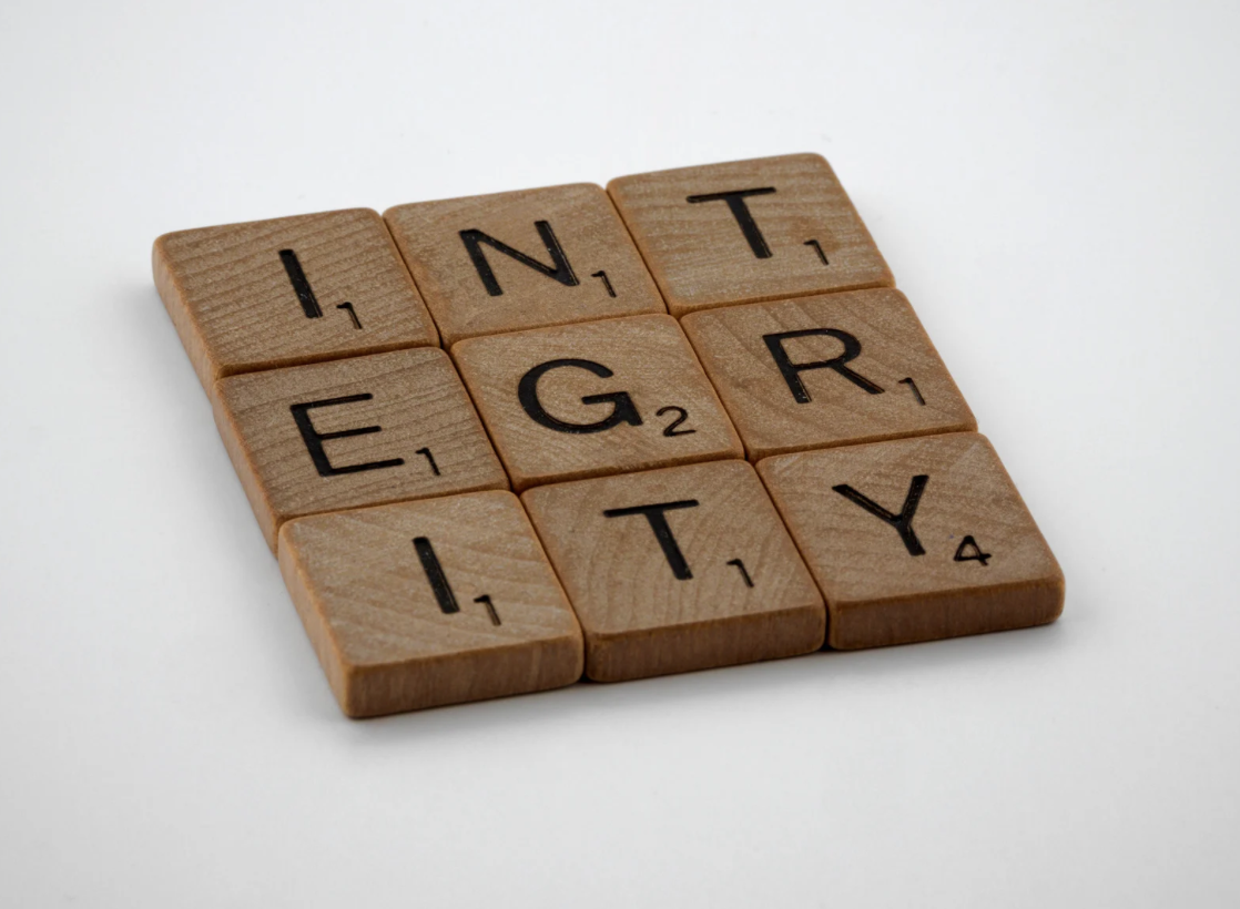 Scrabble tiles spelling INTEGRITY.