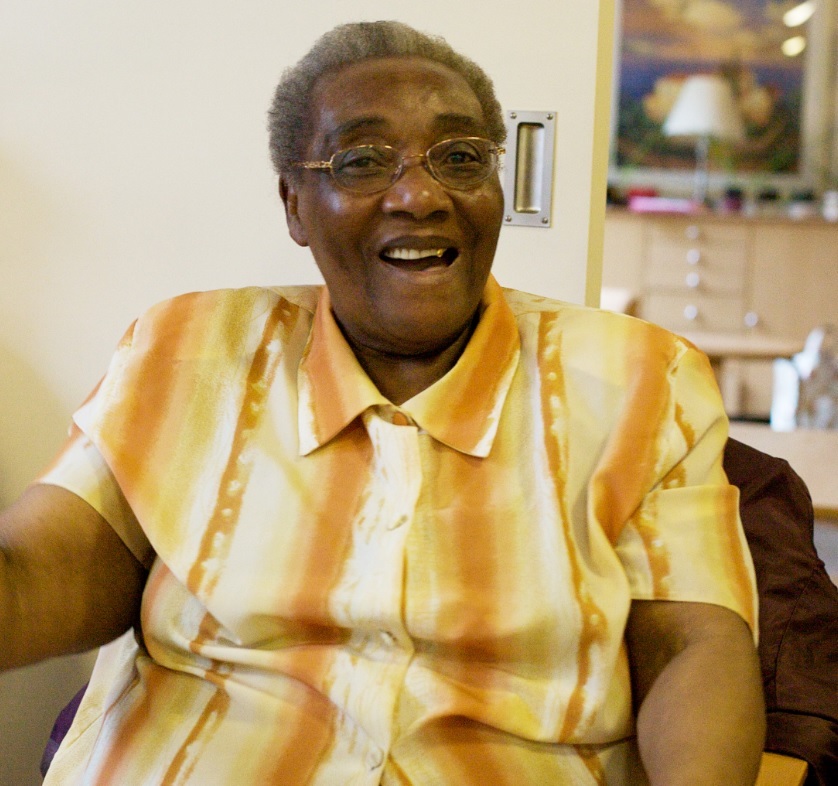 A photograph of an elderly woman and hypothetical patient