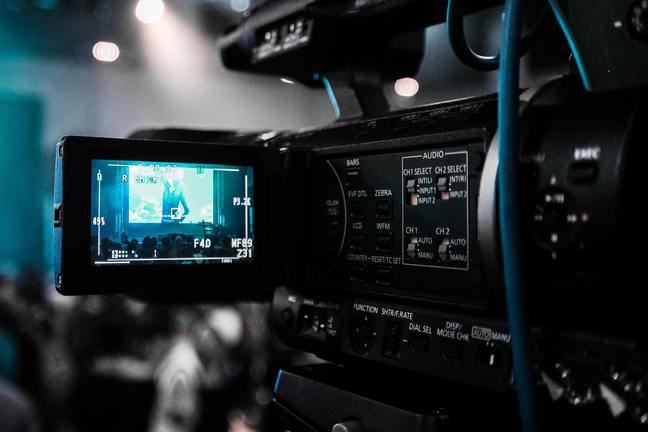 Close up of a camera body and viewfinder whilst filming