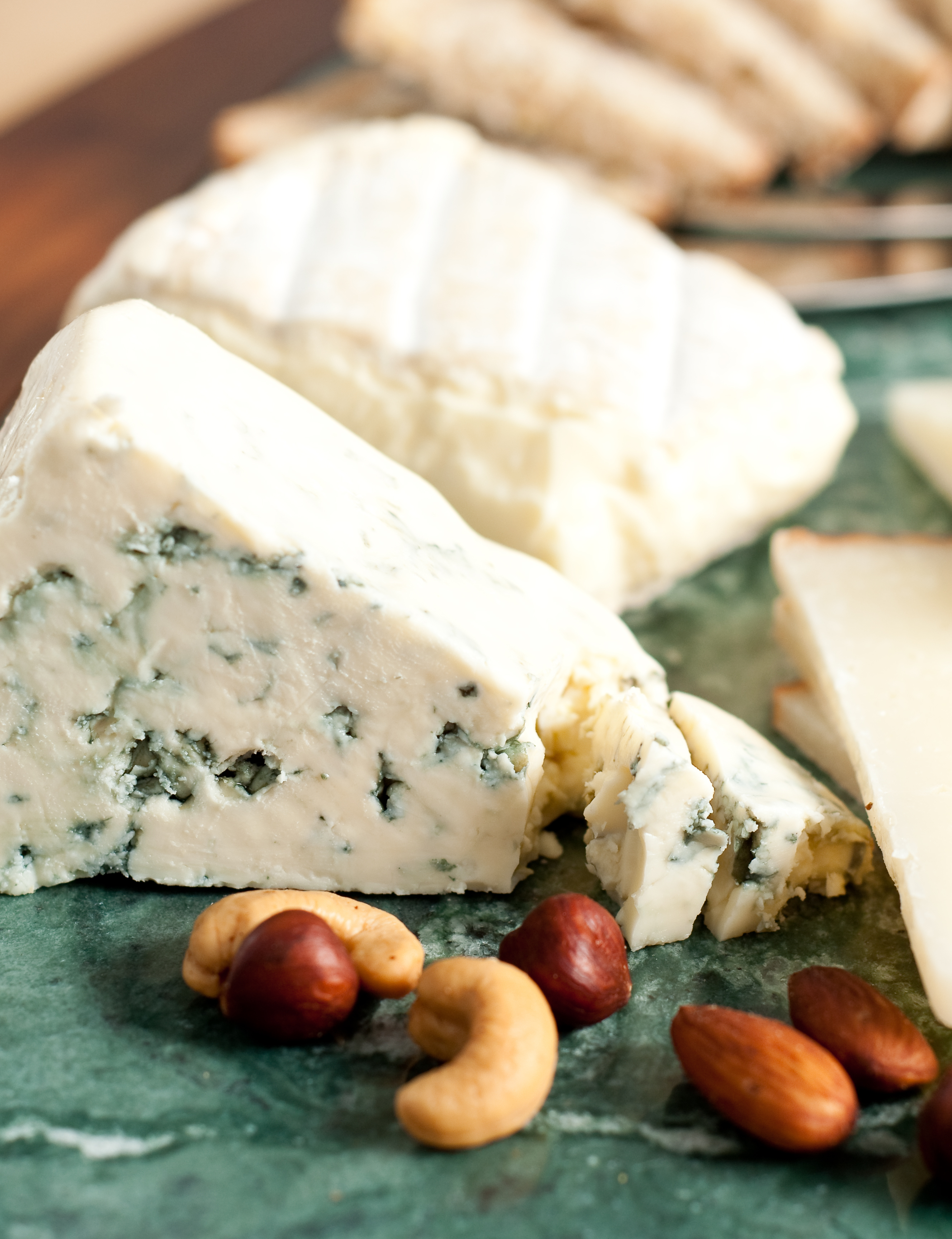 Danish Blue and Brie Cheese on a cutting board