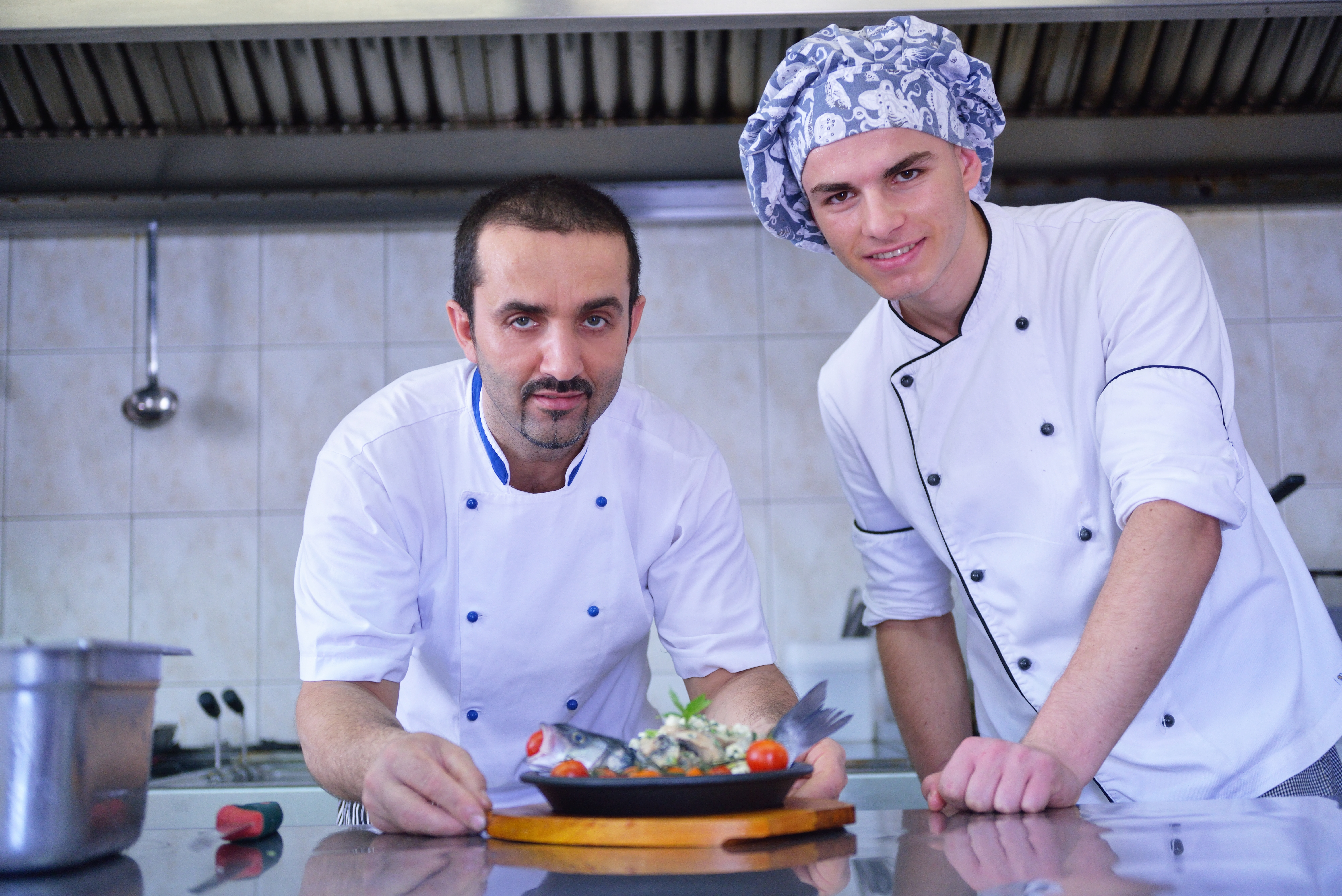 Chefs presenting food