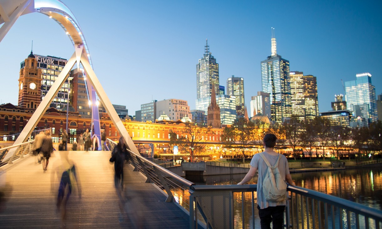 Timelapse image of people crossing the yarra river, melbourne