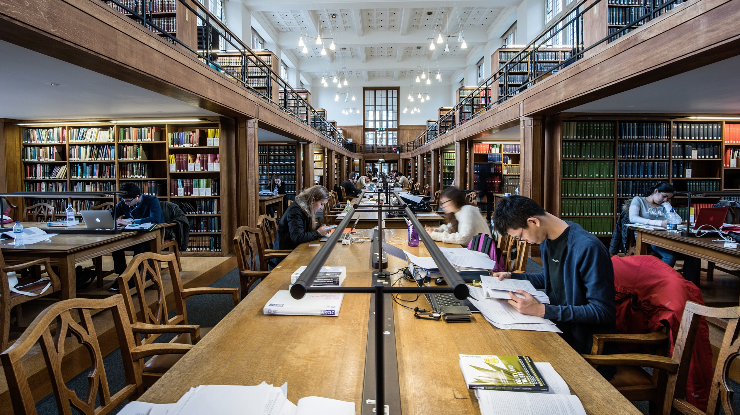 Students studying in the Wills Law Library.