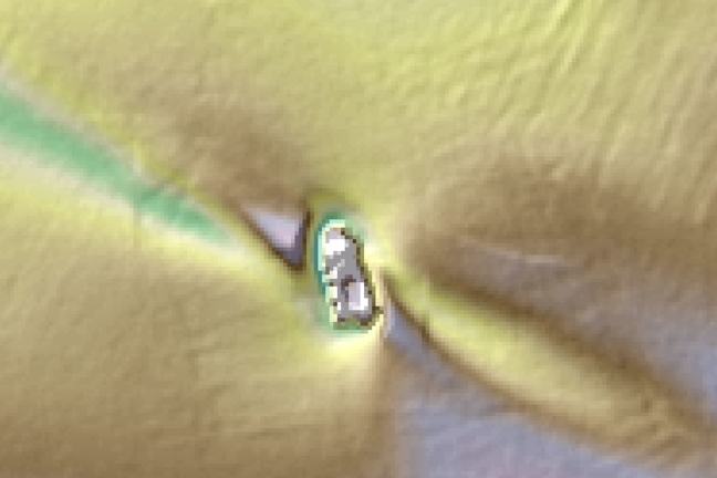 A wreck and associated scour visible in multibeam bathymetry data