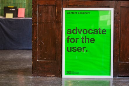 A poster saying 'advocate for the user'