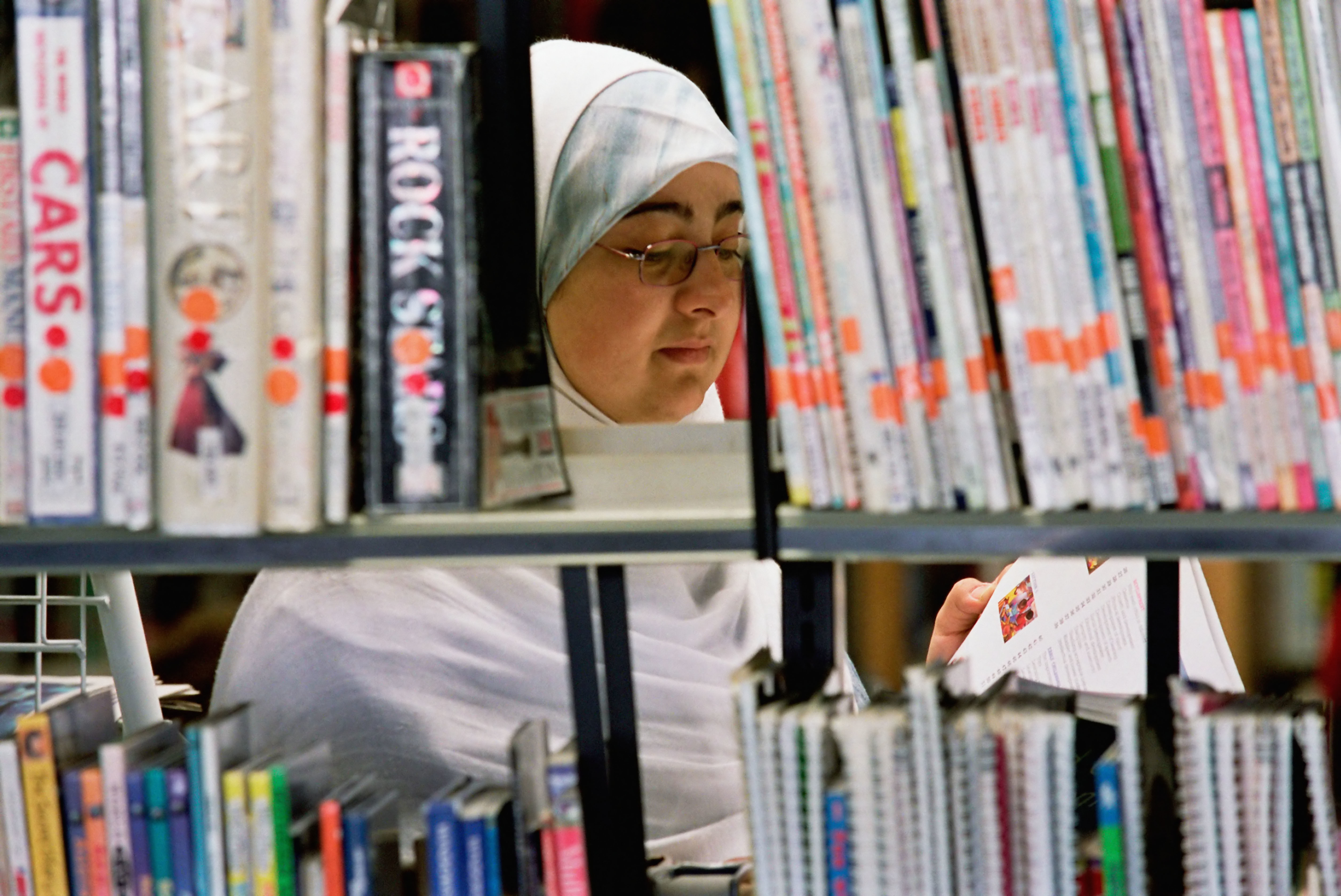 woman reading in library