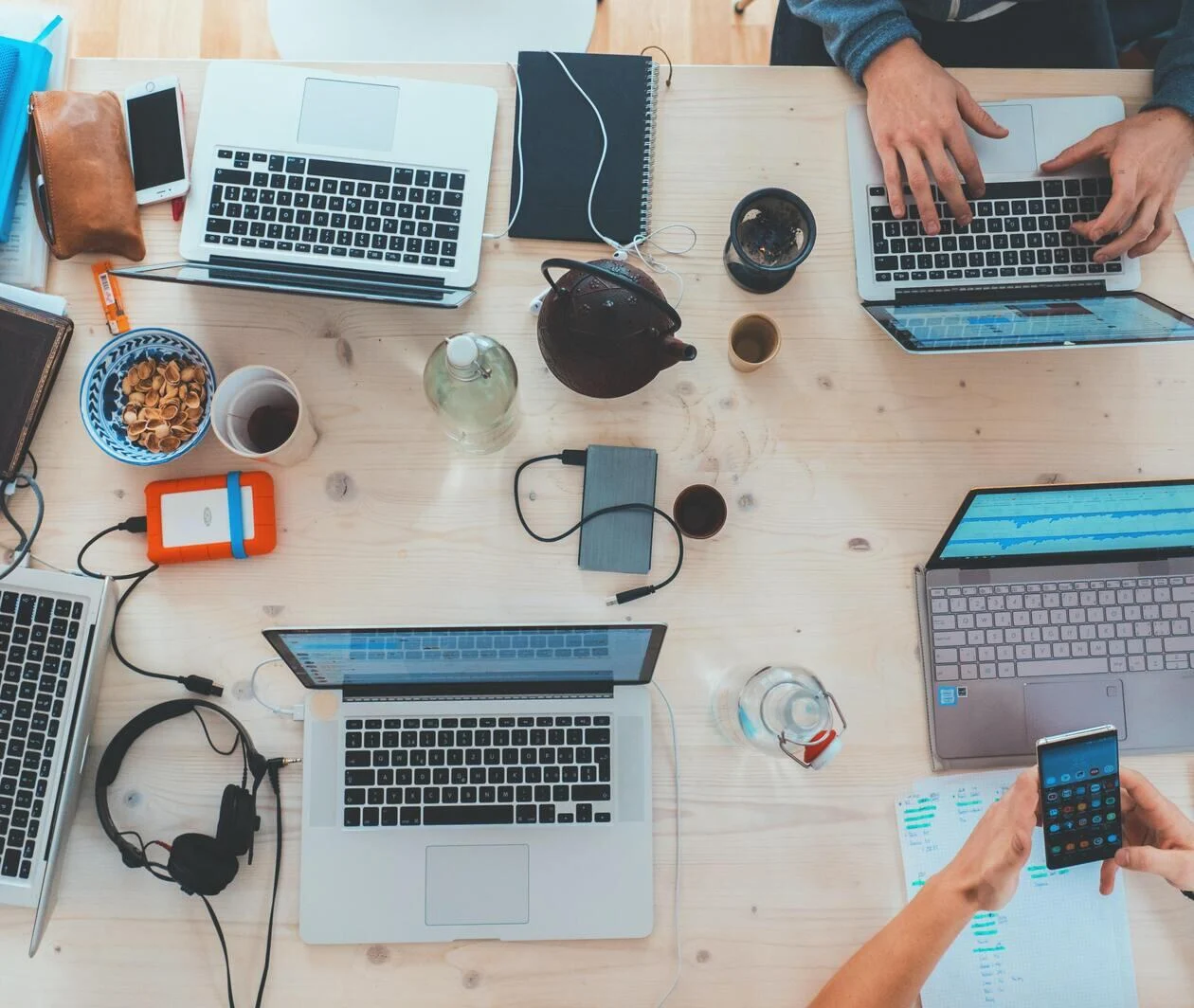 Laptops viewed from above - Unsplash/Marvin Meyer