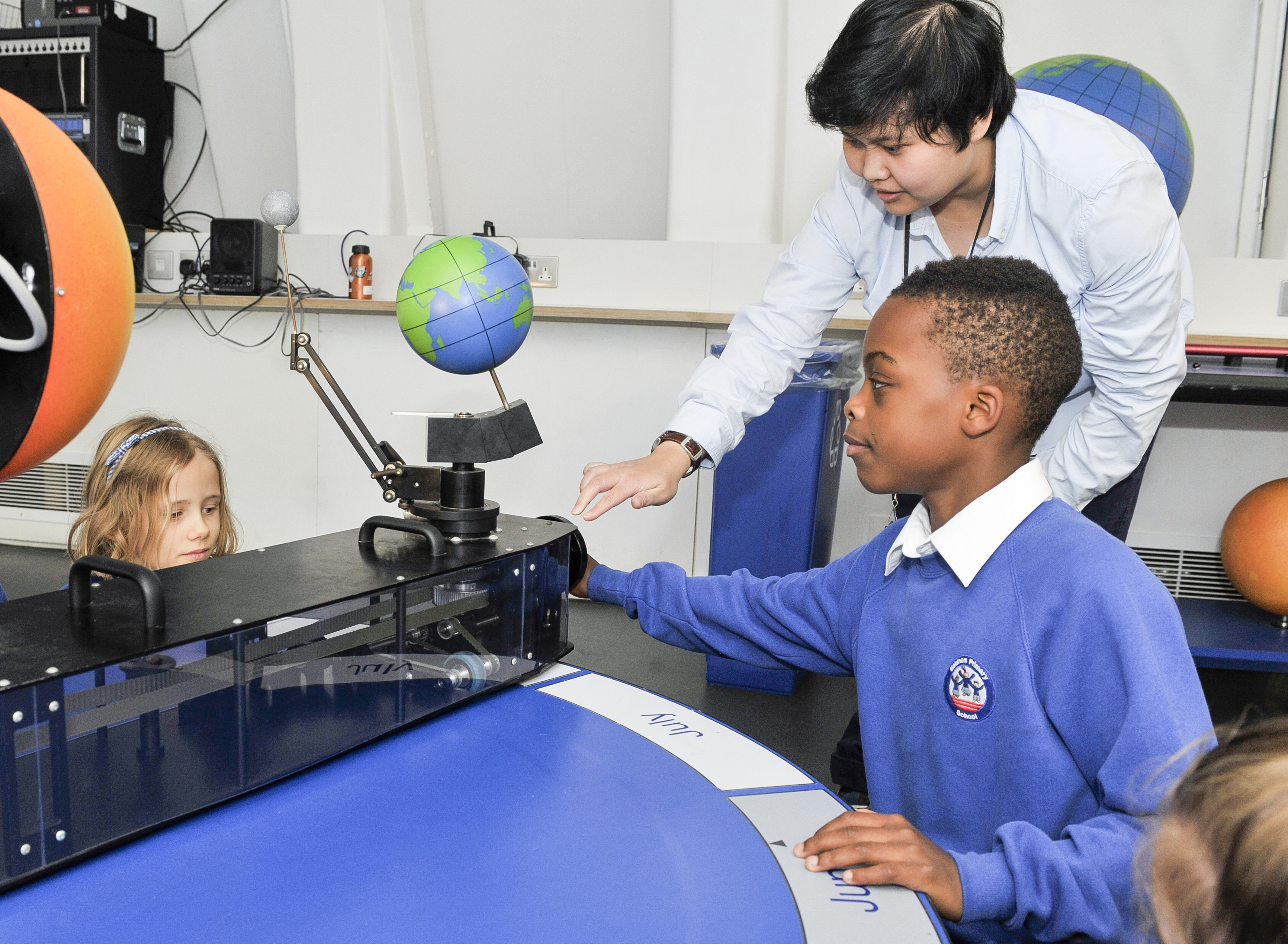 A presenter in a schools workshop