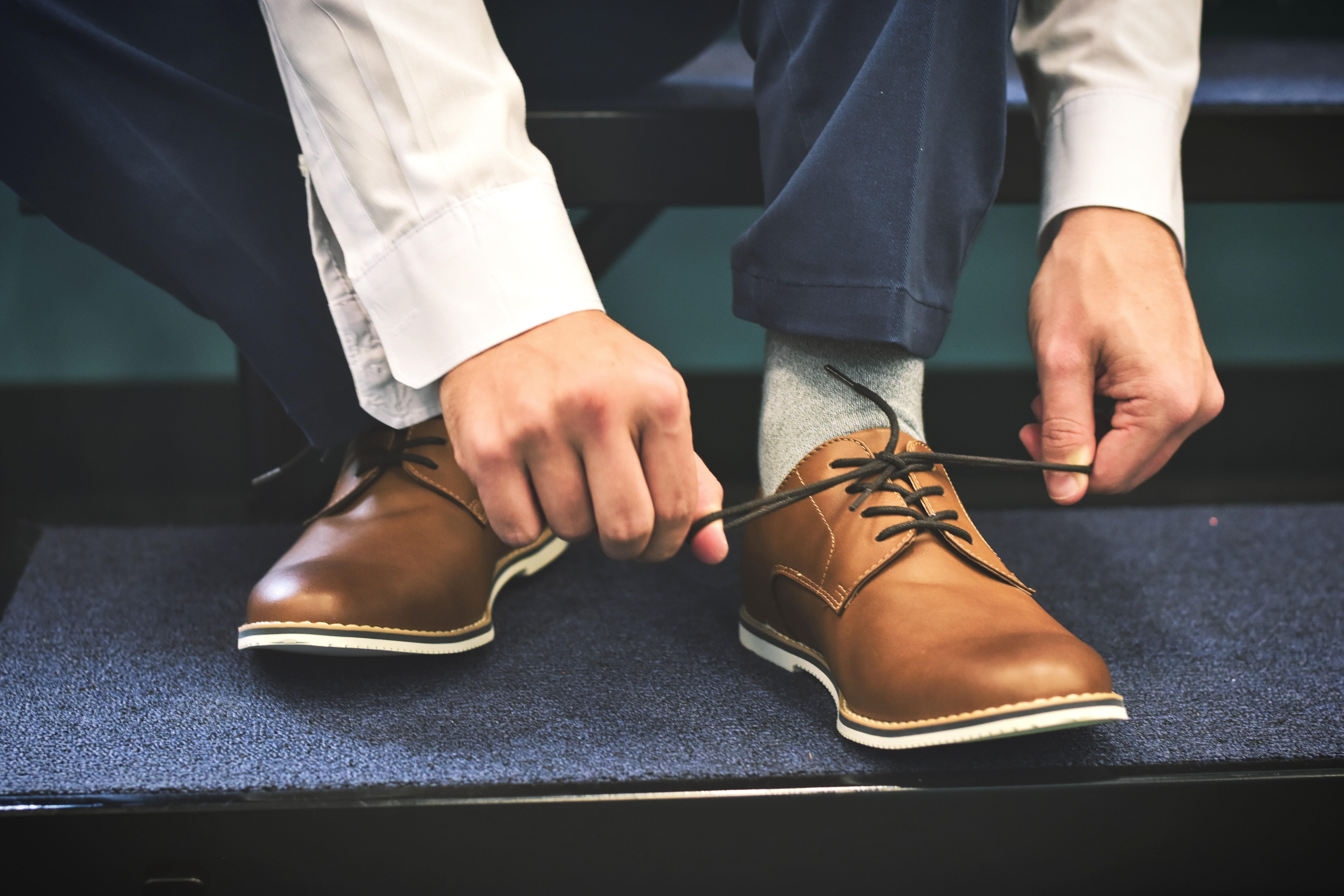 Man tying his shoes