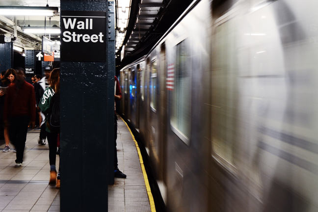 A train coming into Wall Street subway station