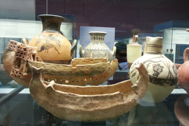 Bronze Age Cypriot boat models and ceramics some with images of boats