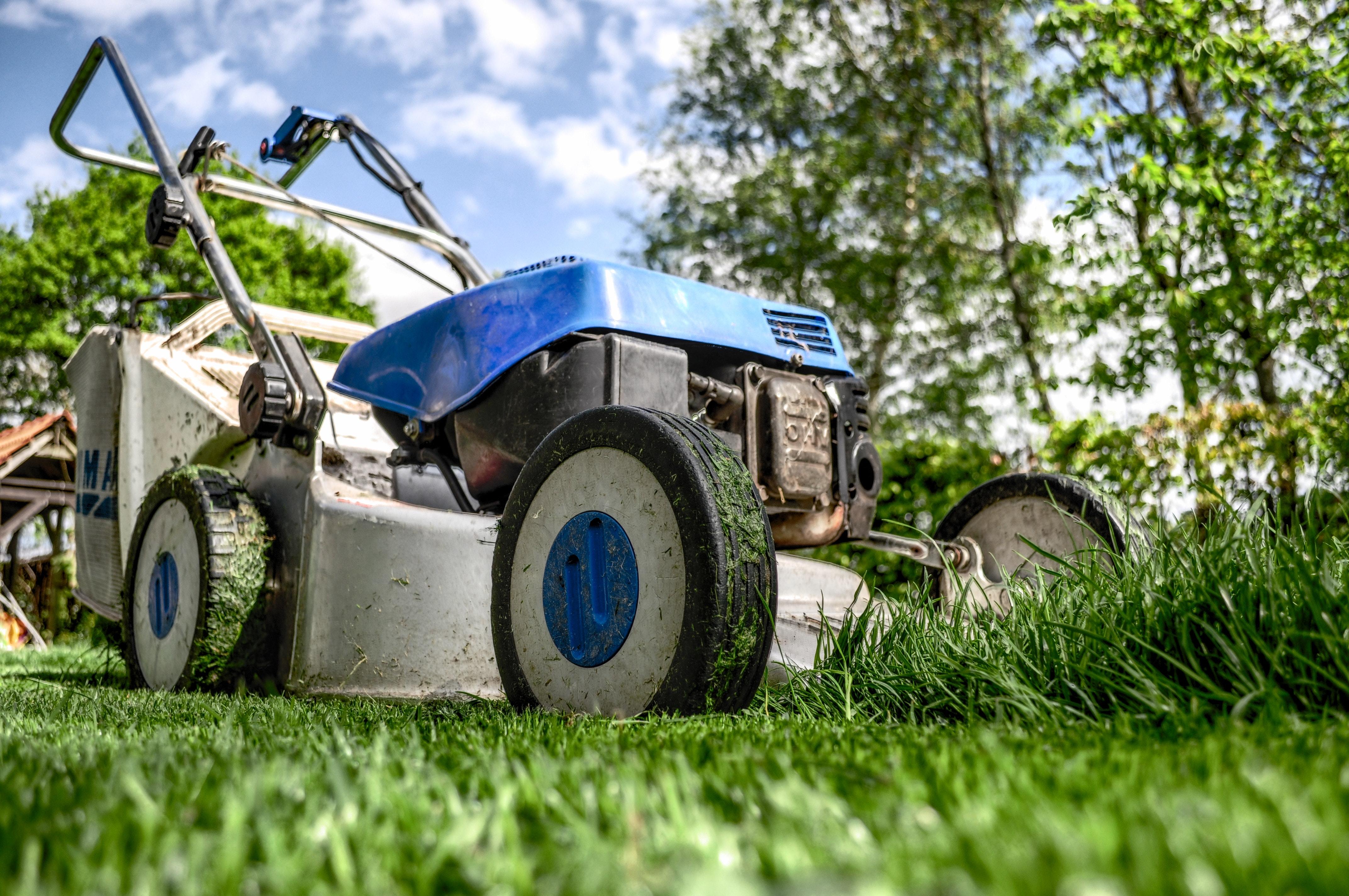 lawnmower mowing grass