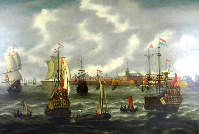 The painting in strong colours shows Dutch cogs, two anchored ones and two with set sails, in the foreground smaller ships and boats. In the left background more ships as well as a city view in the central background.