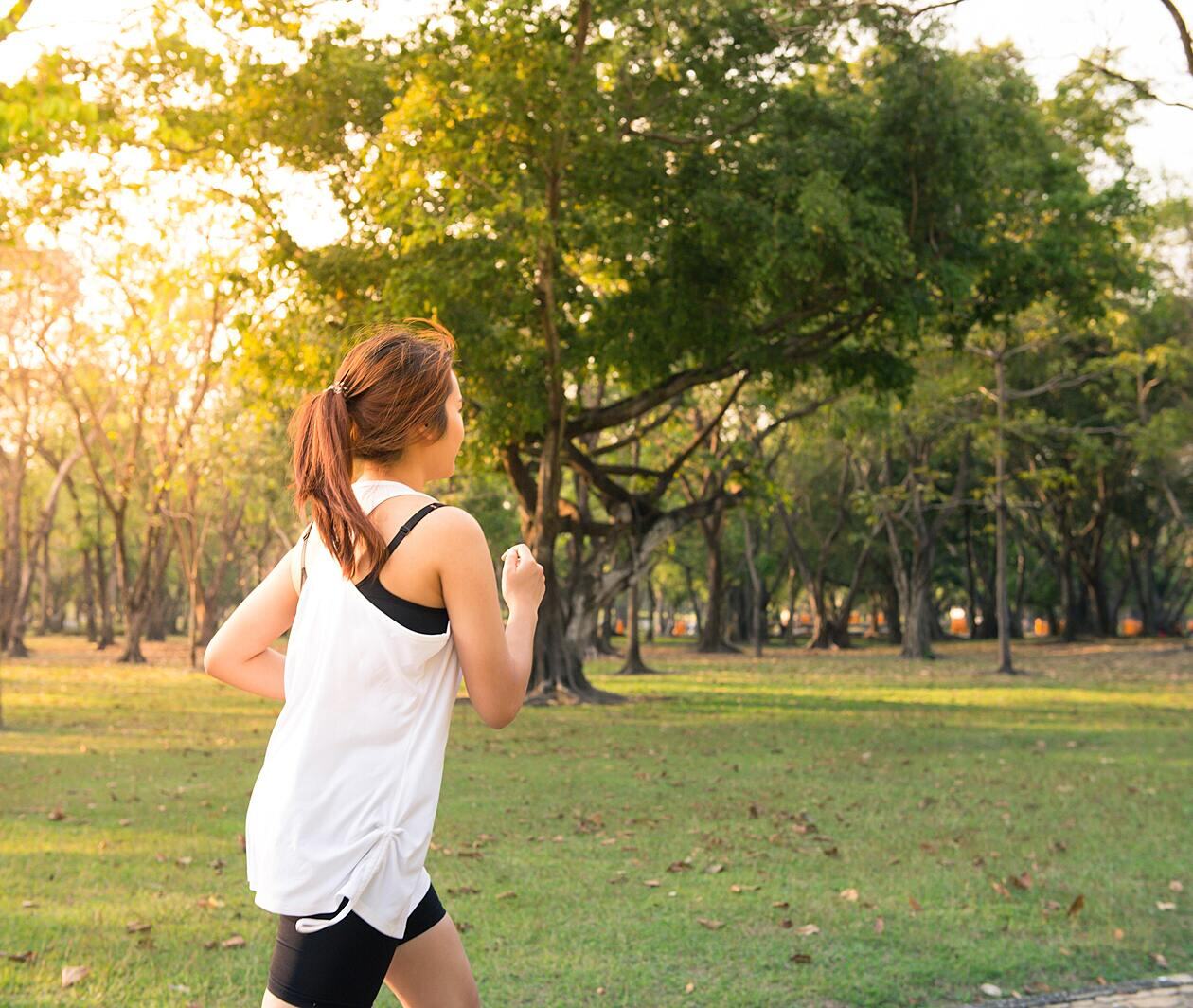 Woman running in the outdoors.