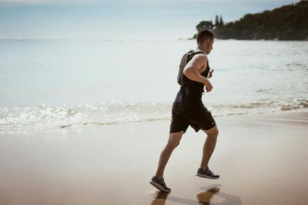 A man jogging at beach