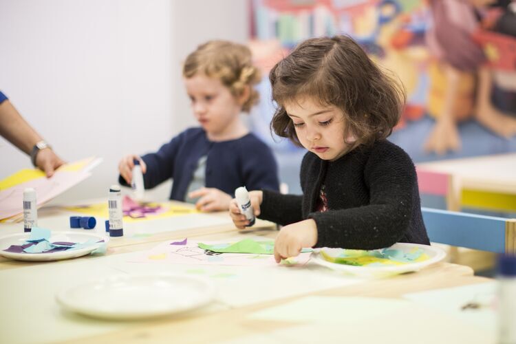 Young child doing artwork