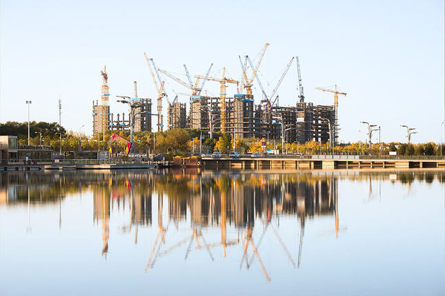 Consrtuction site view across a body of water