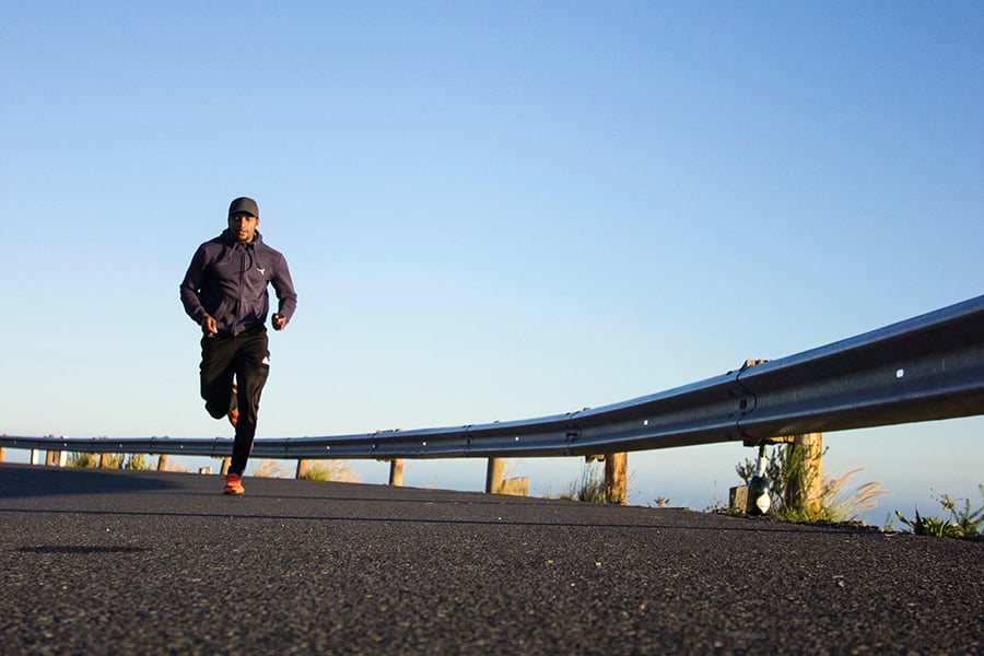 A man running on pavement