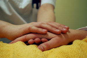 Two hands touching