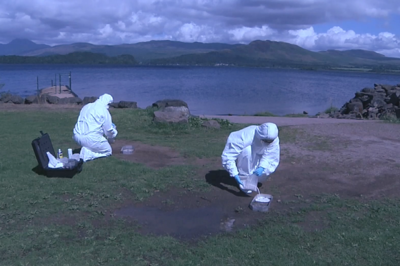 Forensic scientists casting footwear impressions