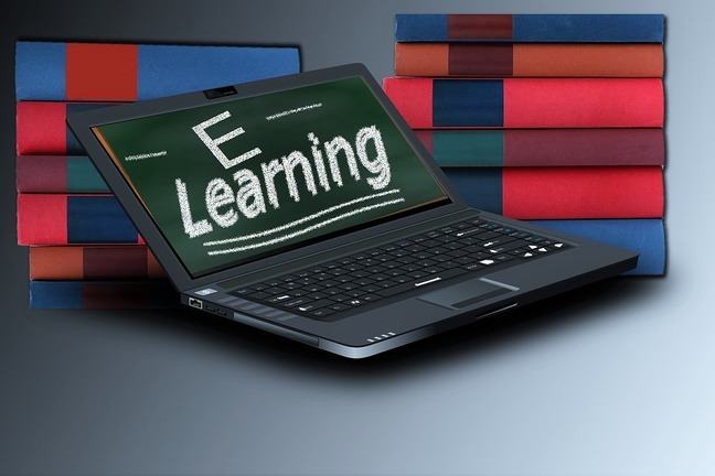 Image of books and laptop