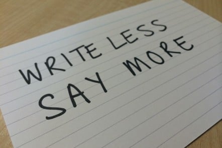 a card with 'write less, say more' written on it 