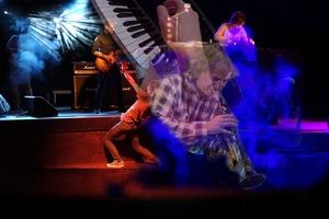 A collage of performing musicians.