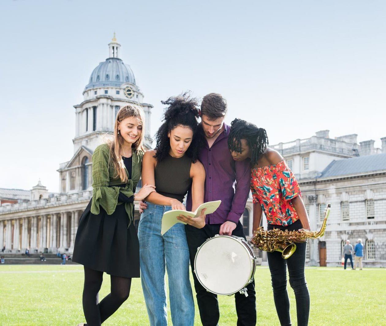 A gathering of students with instruments