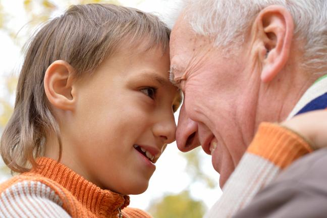 Boy and Grandfather smiling