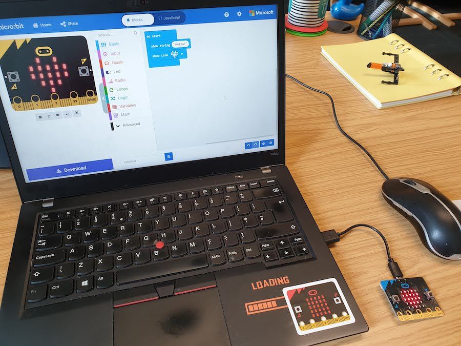 Laptop with micro:bit showing Maker Code