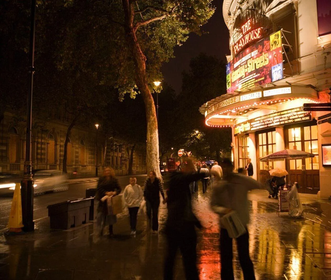 A busy street in London, England, at night