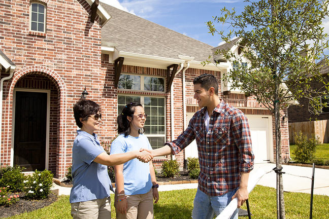 two females buying a new home