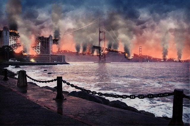 This image shows factories emitting pollution on the coast linking pollution sources with the ocean.