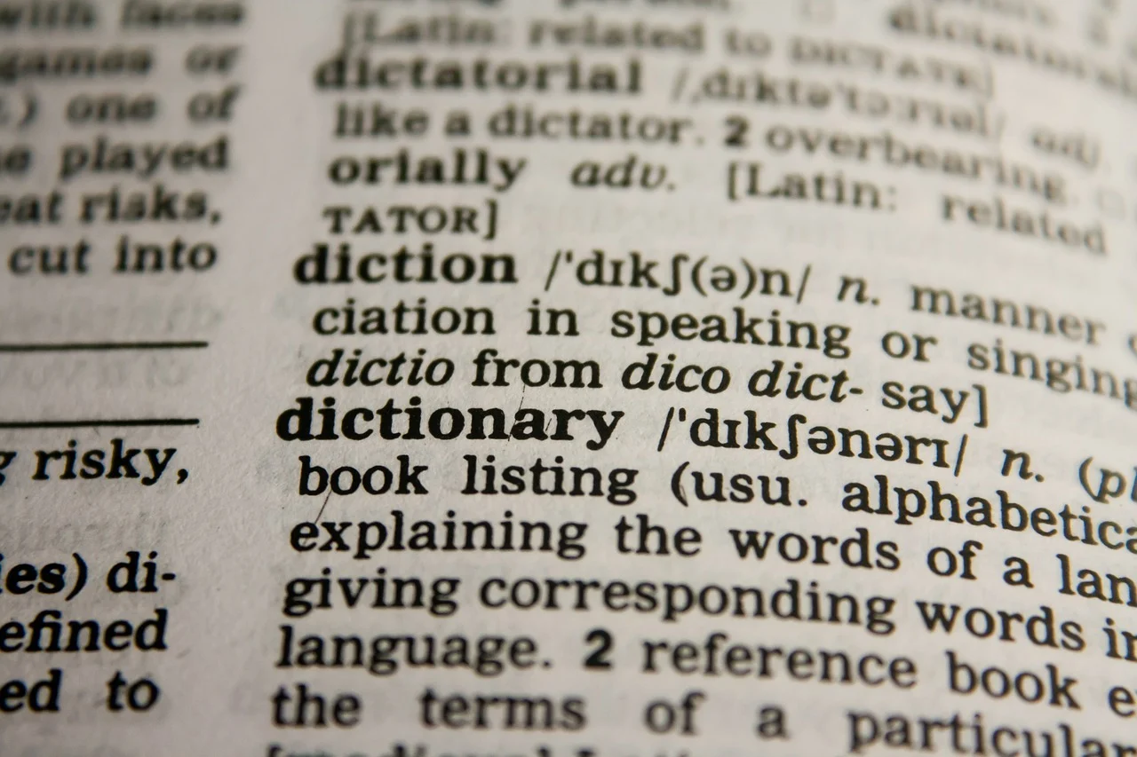 A hard copy book showing a dictionary entry