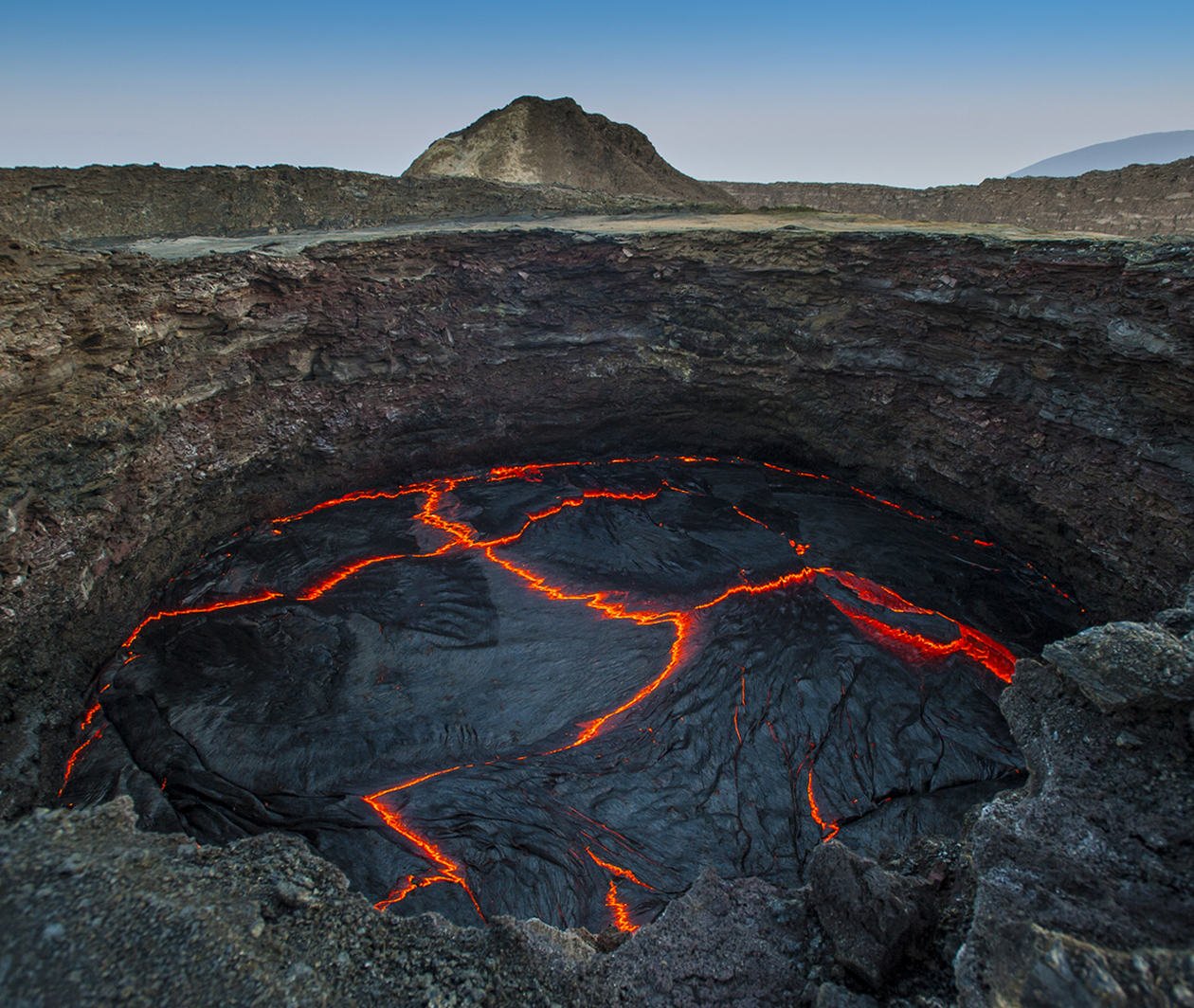 Lava landscape with a volcano