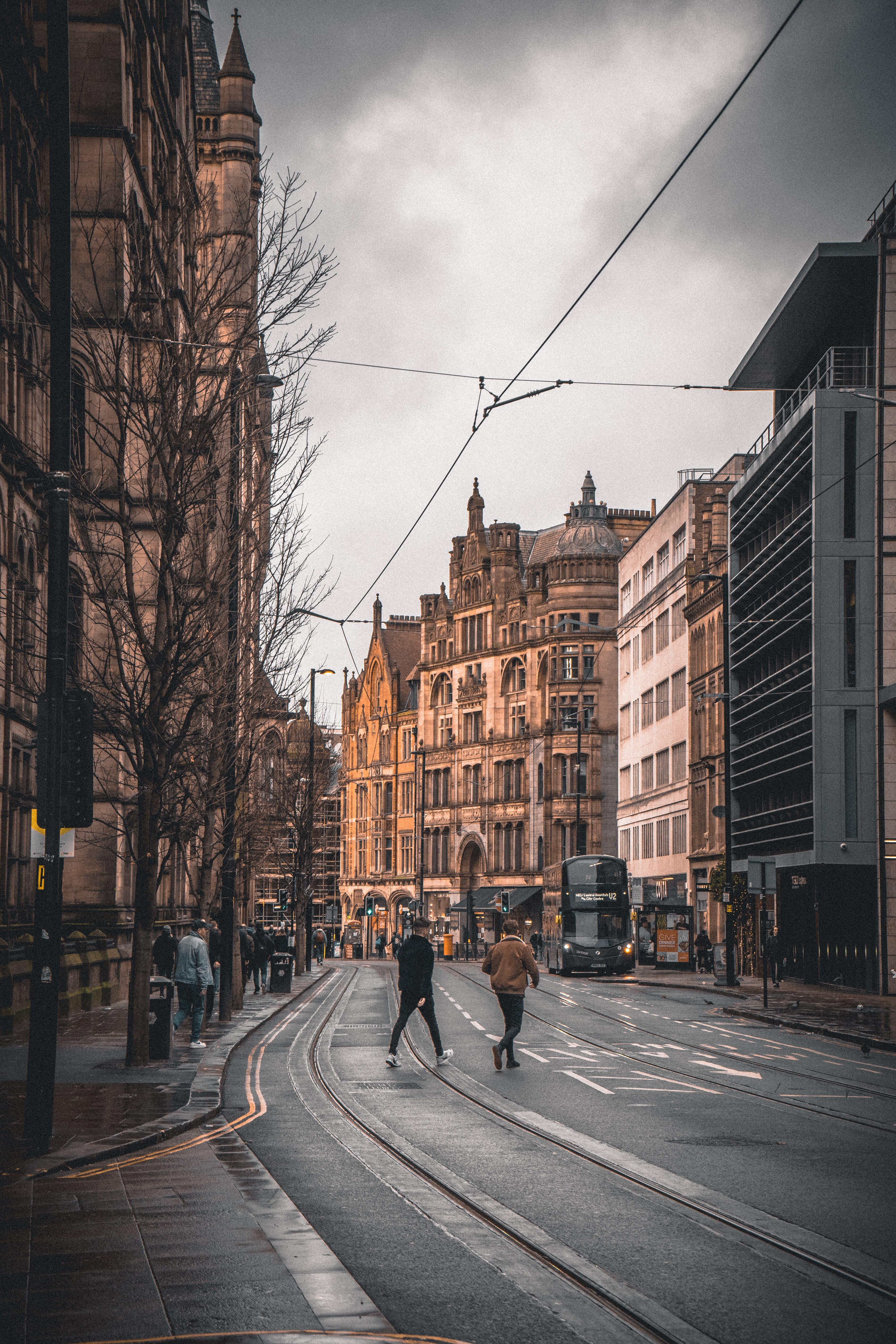 People crossing a Manchester road