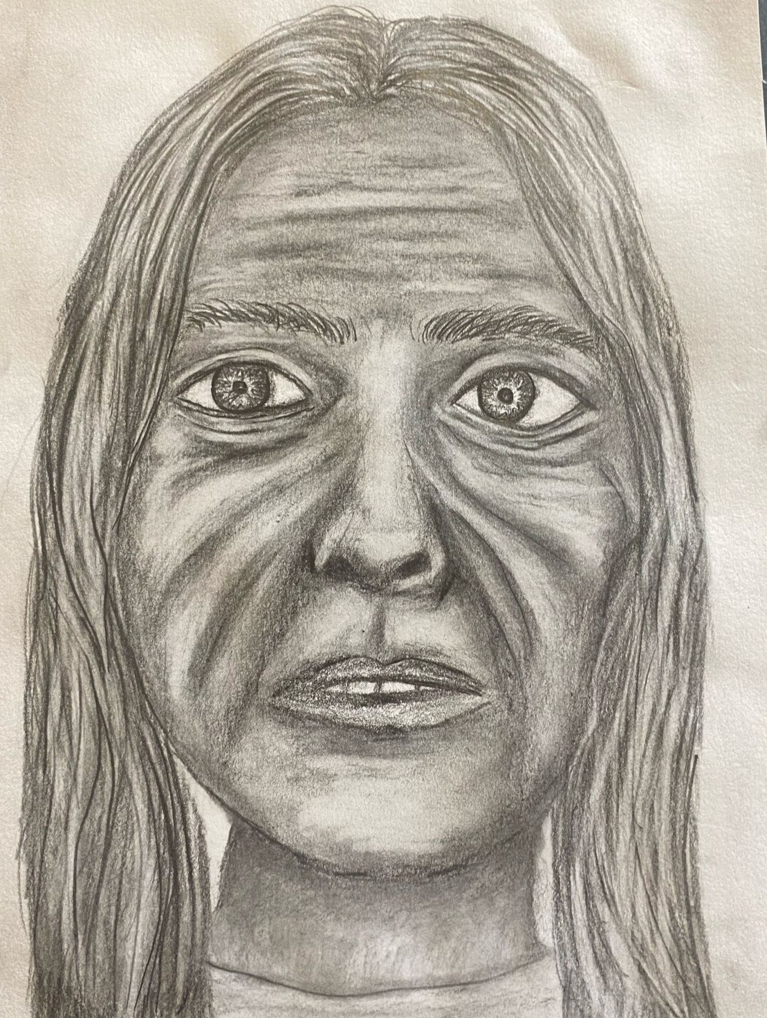 Child's hand drawing of an anxious face