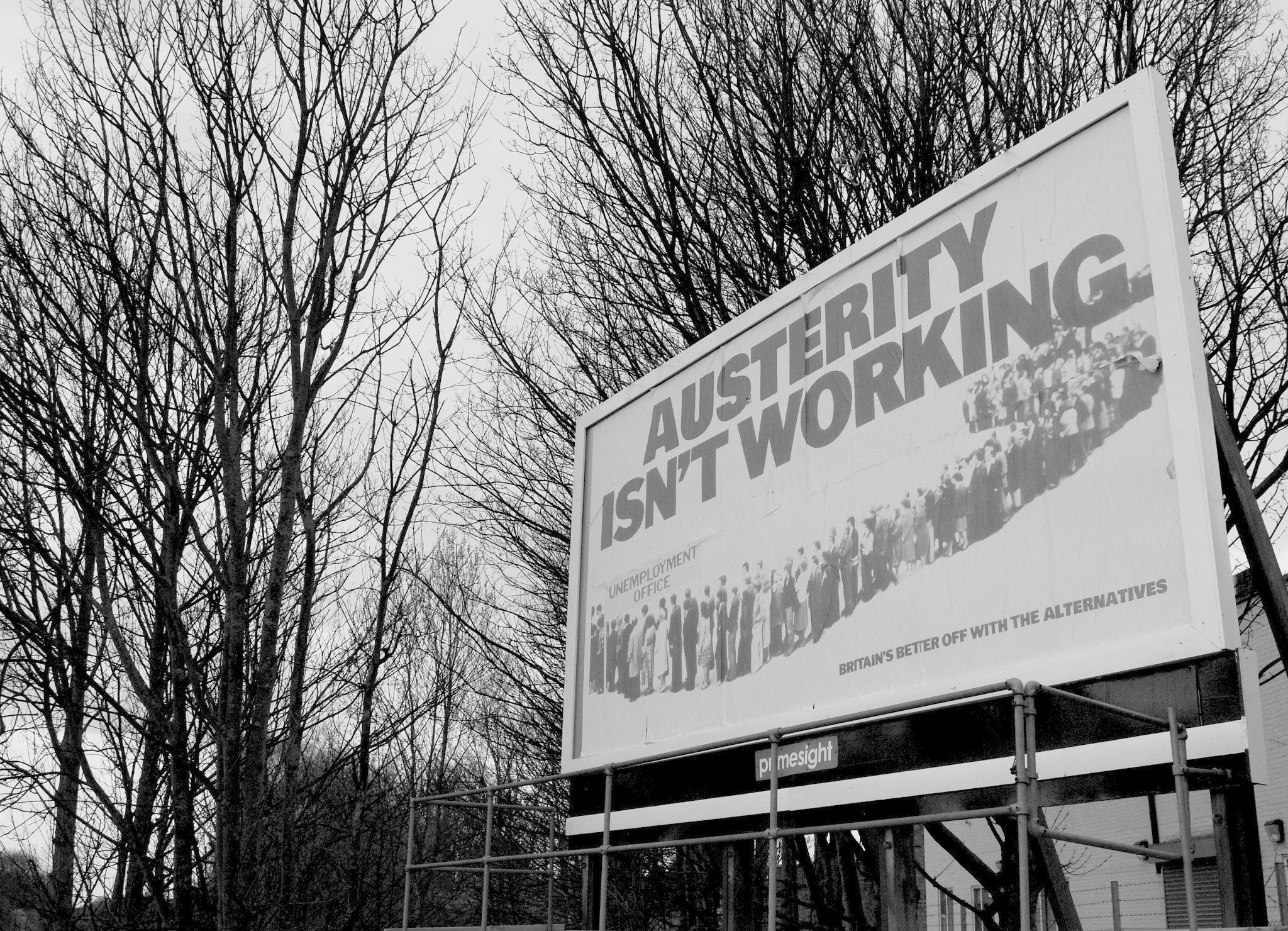 Street billboard with slogan Austerity isn't working